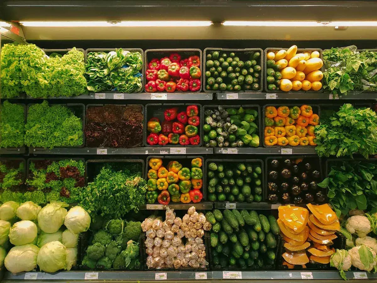 Fresh groceries and produce arranged on a kitchen counter for a family meal plan
